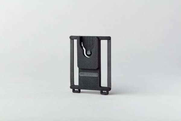 Zoom bild av Klick Fast Belt Dock – bältesfäste för säker utrustningsbärning